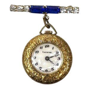 Vintage Lucerne Brooch Watch Swiss Made Gold Tone Etched Face Rhinestones Blue